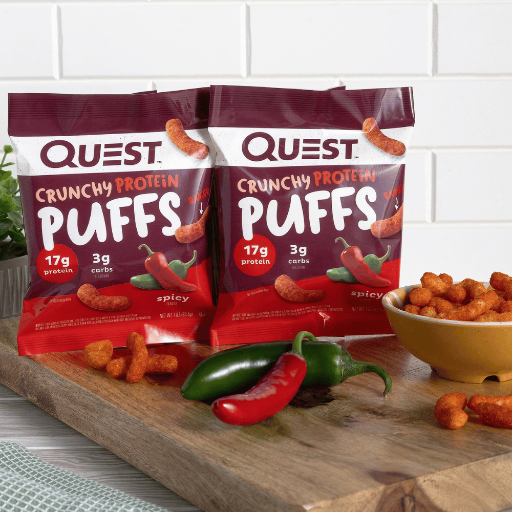 Quest Nutrition Spicy Crunchy Protein Puffs opened packet in a bowl